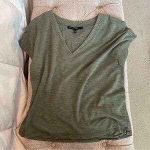Green women’s shirt